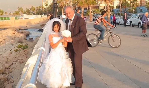 Child bride in wedding gown shocks onlookers in Lebanon